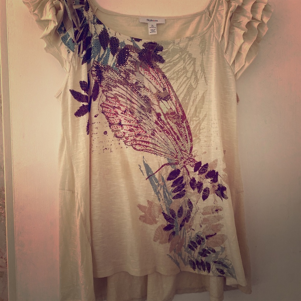 Cute summer top with feminine detail